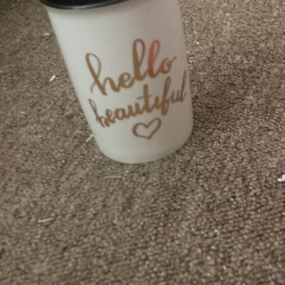 it is white and black inside of it has a kinda lot of space to put stuff